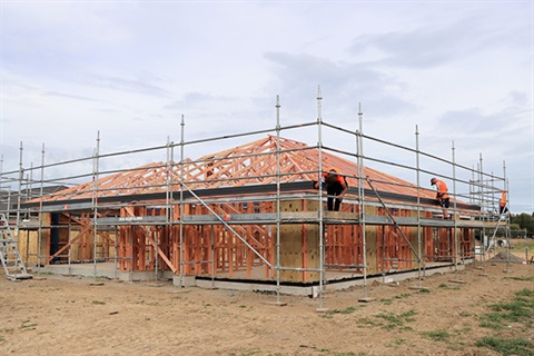 Streamlined Housing Process Drop-in Sessions - House being built.